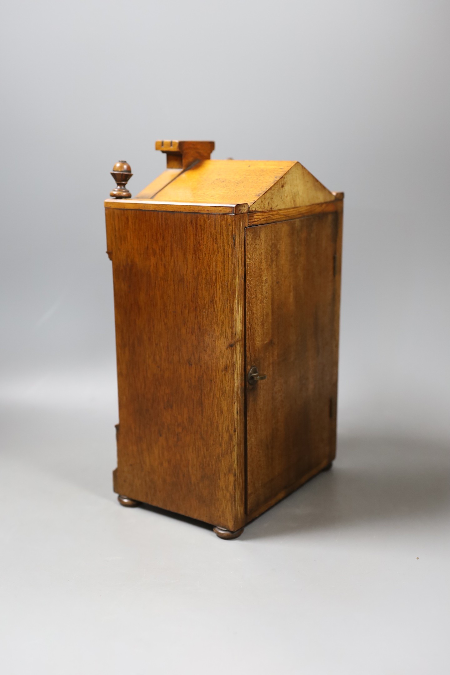 A late 19th century mantel clock in a walnut and Tunbridgeware banded case